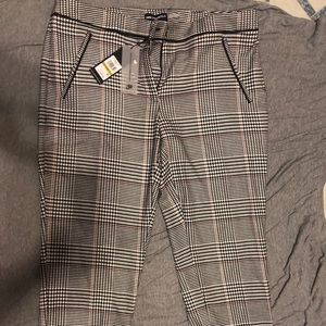 Plaid pants with mauve stripe